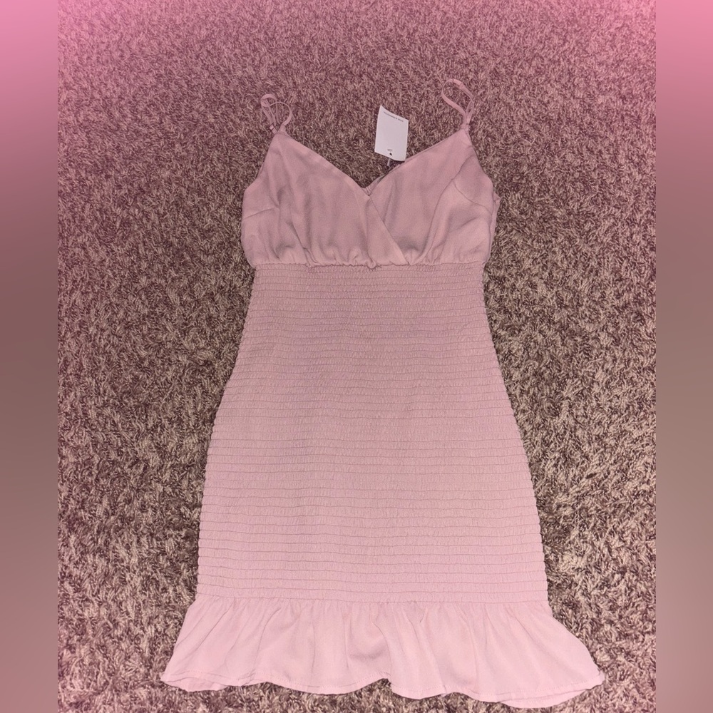 Pink dress with v neck button